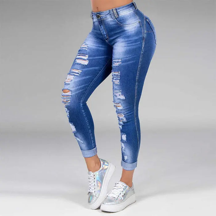 ripped holes show thin stretch jeans