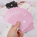 Beautiful girl playing cards solitaire
