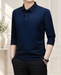 Navy textured long-sleeve polo shirt in an ivory interior.