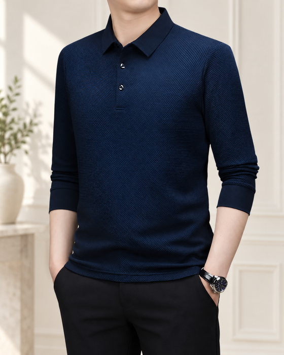Navy textured long-sleeve polo shirt in an ivory interior.