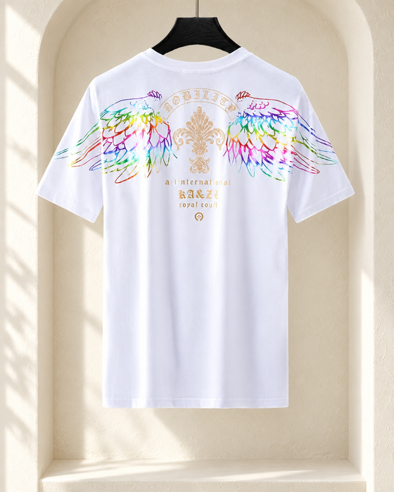 White short-sleeve T-shirt with multicoloured wings and gold ornamental lettering on a black hanger.