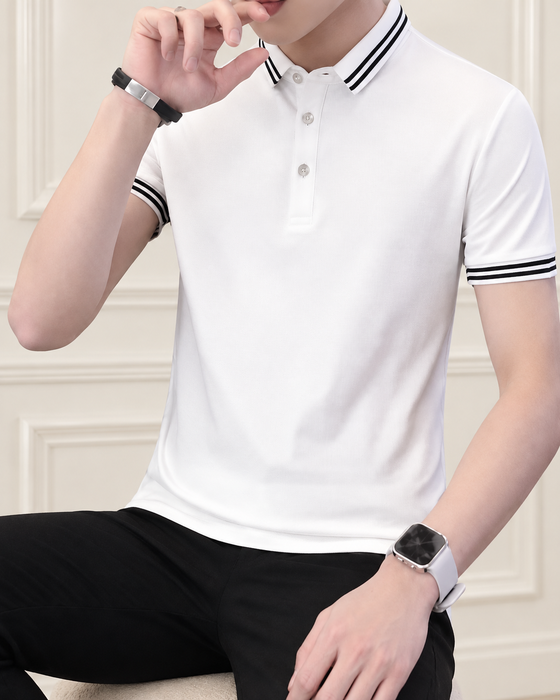 White polo with double black trim in an ivory interior.