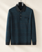 Dark green long-sleeve polo with subtle stripes on a hanger.