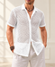 White open-mesh short-sleeve shirt in an ivory interior.