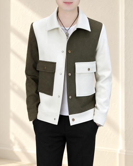 Olive and offwhite colour-block jacket with two flap pockets, worn in an ivory interior.