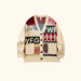 Cream patchwork cardigan with bear applique, five buttons and two pockets on an ivory background.