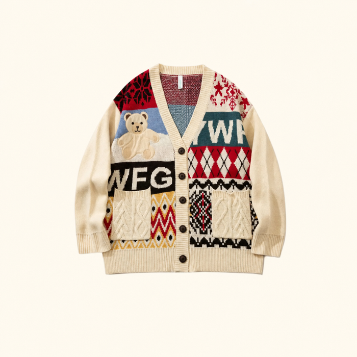 Cream patchwork cardigan with bear applique, five buttons and two pockets on an ivory background.