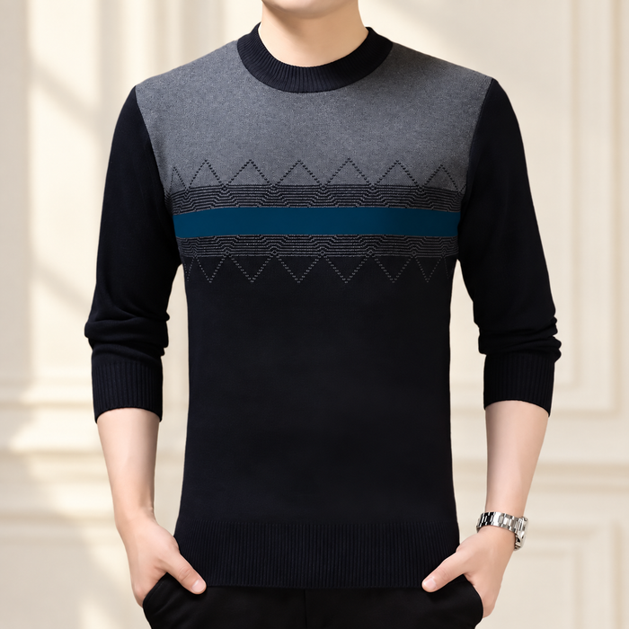 Navy sweater with grey shoulder panel and blue chest stripe.