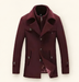 Wine-red long coat with layered collar and visible lining fold on an ivory background.