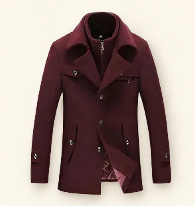 Wine-red long coat with layered collar and visible lining fold on an ivory background.