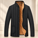 Black quilted jacket with tan fleece lining against an ivory dressing-room backdrop.