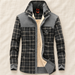 Grey plaid sherpa-lined jacket laid on ivory linen.