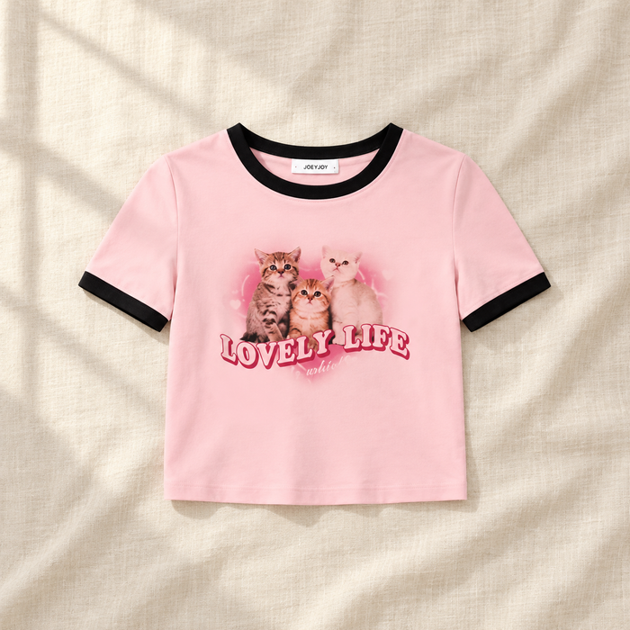 Pink cropped cat-print T-shirt with black trim on ivory linen
