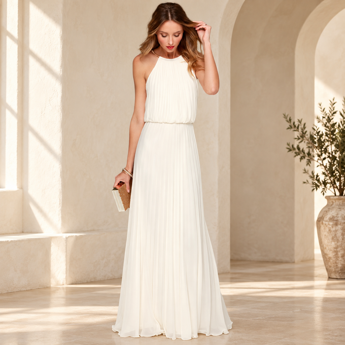 Ivory halter-neck maxi dress with a softly pleated bodice in an ivory interior