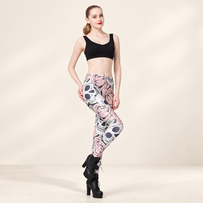 Skull and pink rose leggings on model in ivory studio