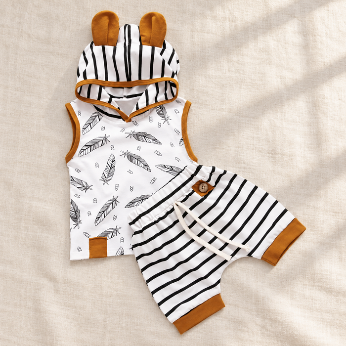 Feather-print hooded top and striped shorts with mustard trim on ivory linen