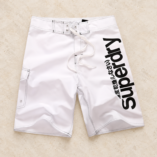 White printed beach shorts on an ivory surface