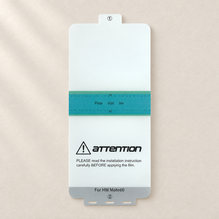 Screen protector installation film on an ivory surface