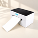 White and black label printer on an ivory desk
