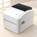 Compact white barcode printer on an ivory desk