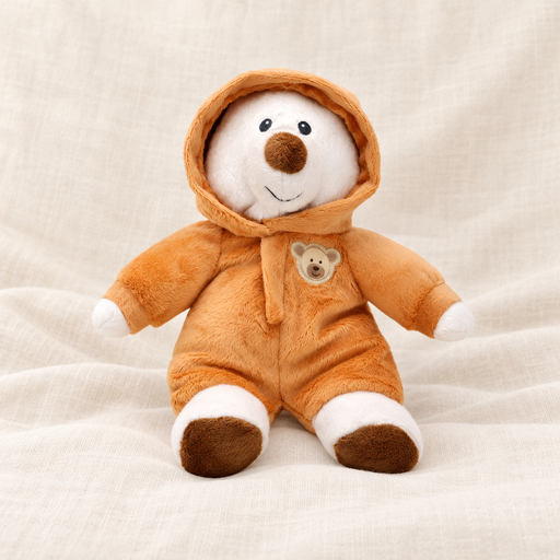 White plush bear in orange hooded suit on ivory linen