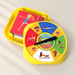 Yellow yoga spinner game on an ivory surface