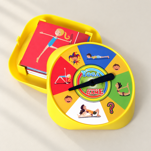 Yellow yoga spinner game on an ivory surface