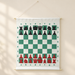 Hanging green and white chess demonstration board with black and red pieces