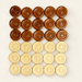 Thirty wooden checker pieces in brown and cream arranged on an ivory surface.