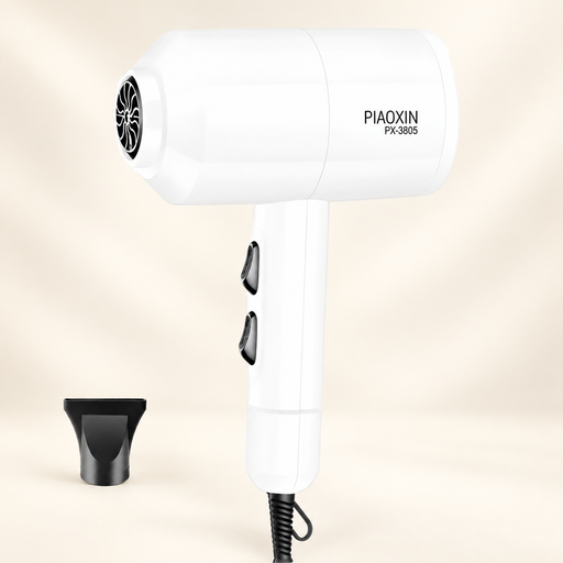 White hair dryer with separate black concentrator nozzle against an ivory background