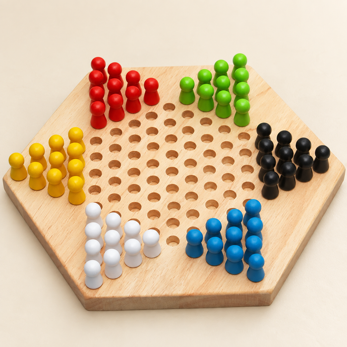 Hexagonal wooden peg game with six groups of coloured pieces on an ivory tabletop.