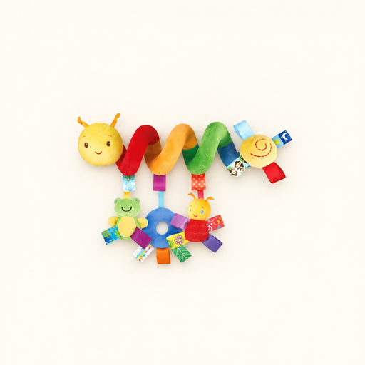 Colourful spiral infant toy with three hanging attachments on an ivory surface.