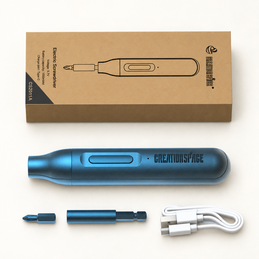 Electric screwdriver set with its box, bit, extension and charging cable on an ivory surface.