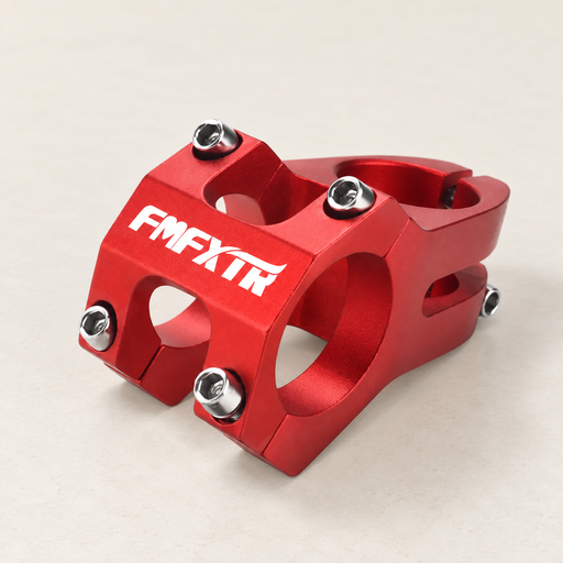 Red bicycle stem with silver bolts on ivory tabletop