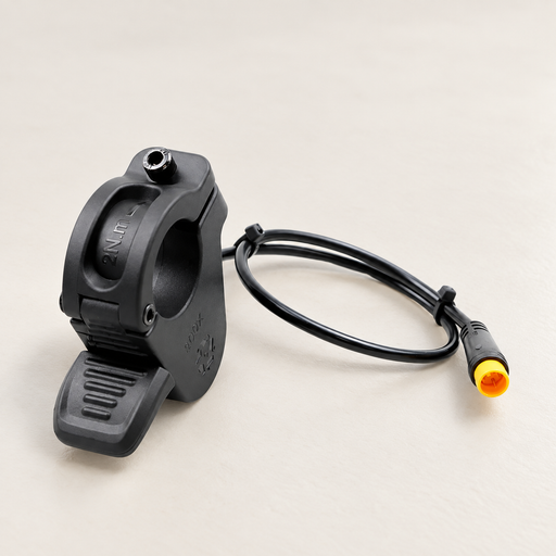 Black bicycle thumb throttle with coiled cable and yellow connector