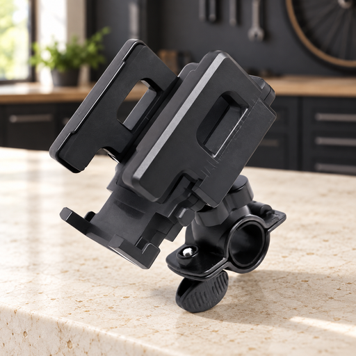 Adjustable black bicycle phone holder on an ivory stone workbench.