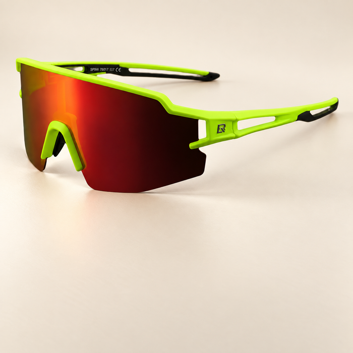 Neon green sports glasses with red mirrored lens on ivory