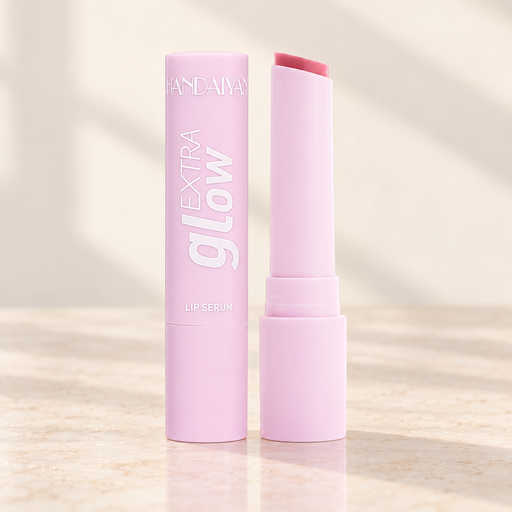 Pale pink lip serum shown closed and open on ivory surface.