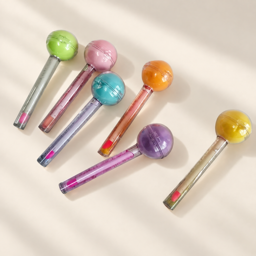 Six colourful round-headed cosmetic tubes on ivory surface.