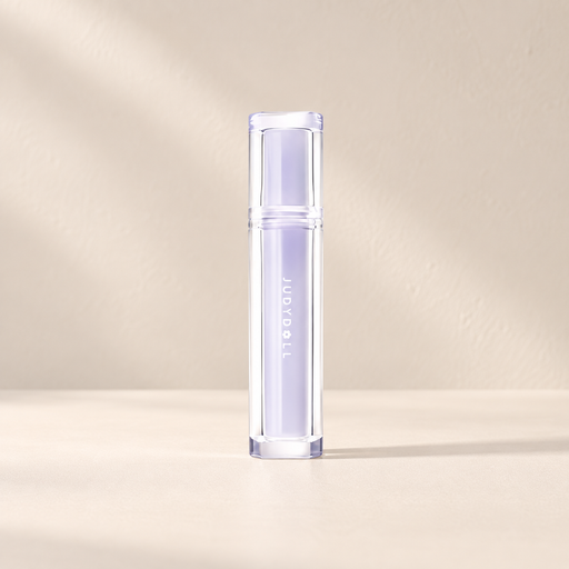 Closed lilac lip glaze tube with transparent casing on ivory