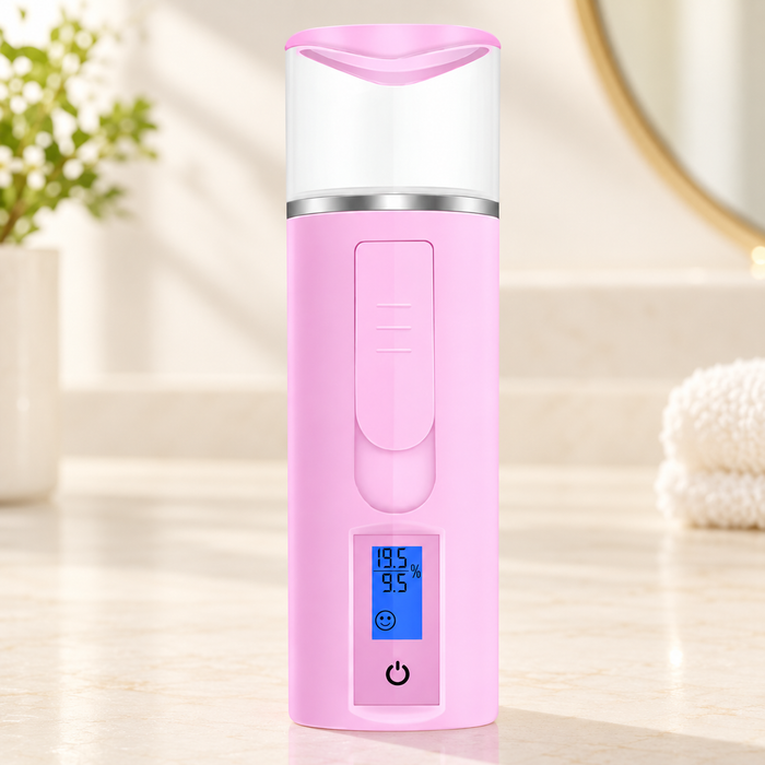 Pink and white facial mister with blue display on ivory vanity.