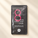 Dark hair treatment sachet with pink number eight on ivory