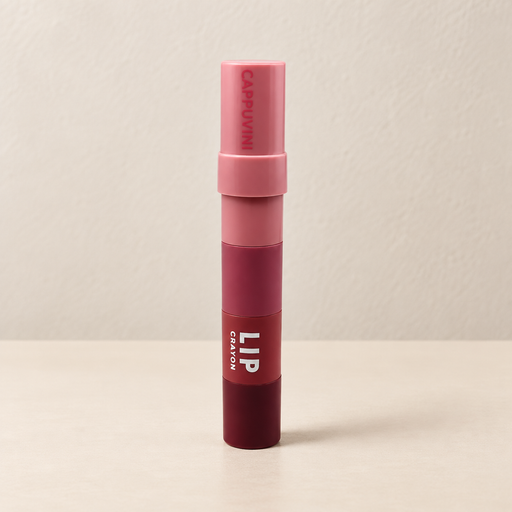 Closed pink and burgundy lip crayon standing on ivory