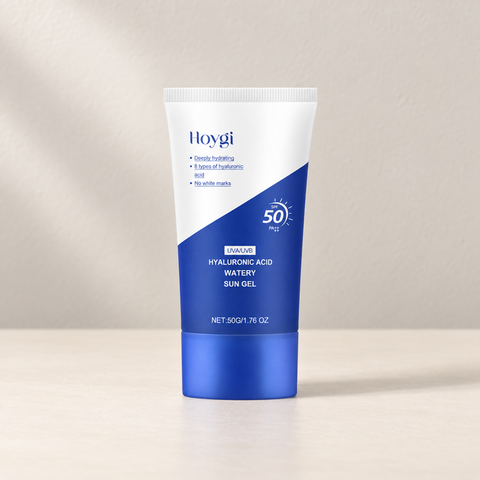 White and blue Hoygi skincare tube standing on its blue cap