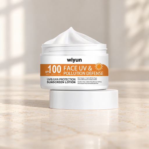 White cosmetic cream jar with orange label resting on its lid.