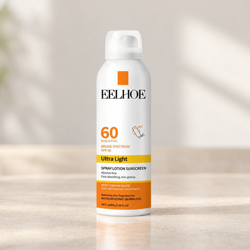 White cosmetic spray bottle with orange and yellow label.
