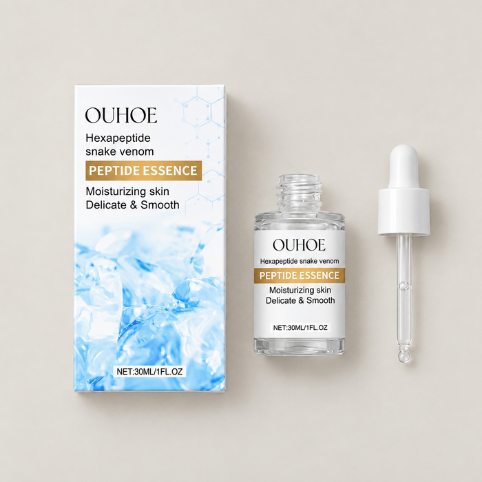 OUHOE peptide essence bottle, blue and white box, and white dropper on an ivory surface