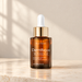 Amber West Month dropper bottle on ivory vanity
