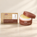 WoodSleep body butter jar with lid resting on rim beside kraft box