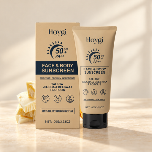 Tan Hoygi sunscreen tube and box on ivory tabletop